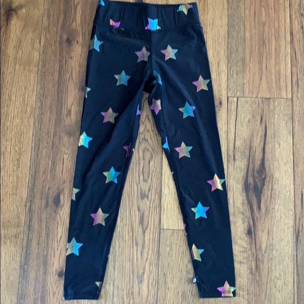 Rainbow foil star leggings.